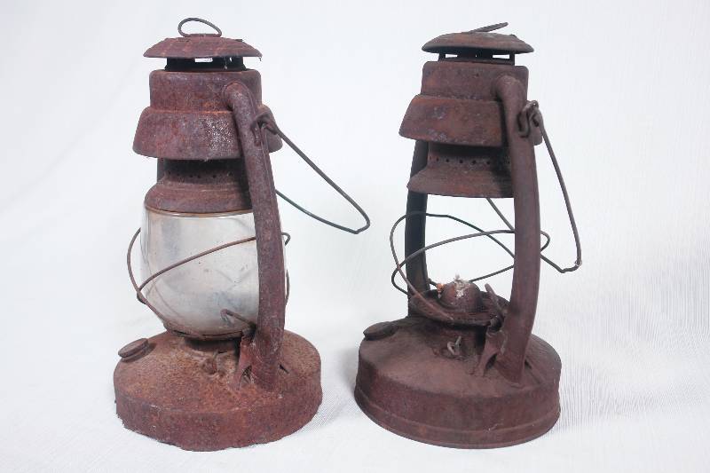 lot 66 image: 2 Rusty old barn lanterns