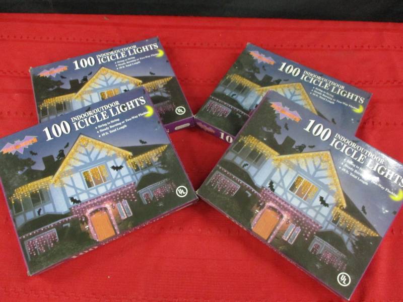 4 sets of Halloween Icicle lights Never opened