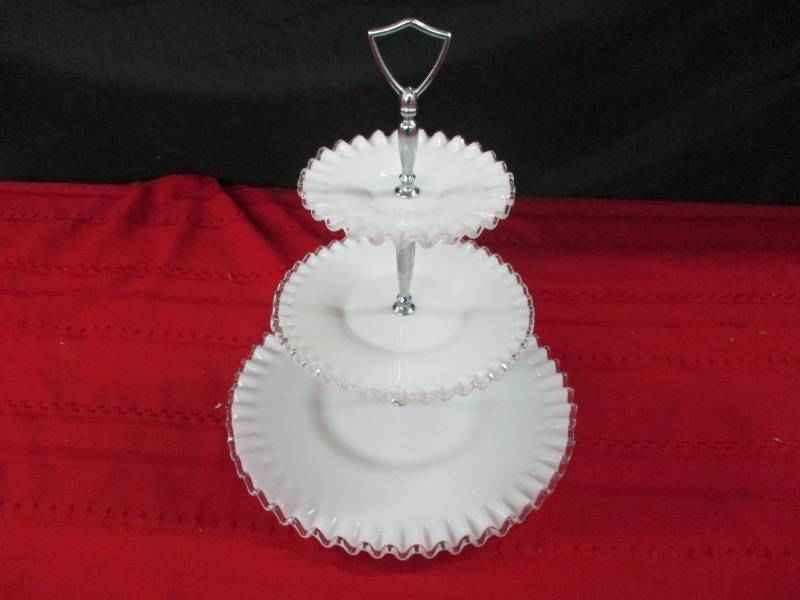 Wave crest tiered tra some hailline cracks on bottom tier
