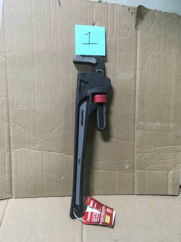 lot 1 image: Husky 18 in. Heavy-Duty Cast Iron Pipe Wrench with 2 in. Jaw Capacity in like new condition