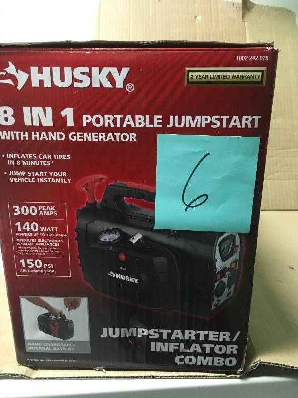 lot 6 image: Husky 8-in-1 12-Volt Power SourceJumpstarter