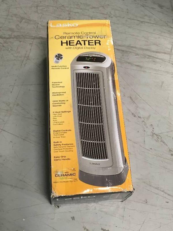 lot 52 image: Lasko 23 in. 1500-Watt Ceramic Tower Heater with Digital Display and Remote Control in good condition