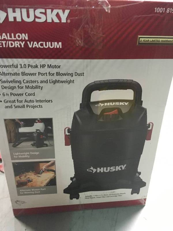 lot 65 image: Husky 4 Gal. Portable Poly WetDry Vac  in like new condition