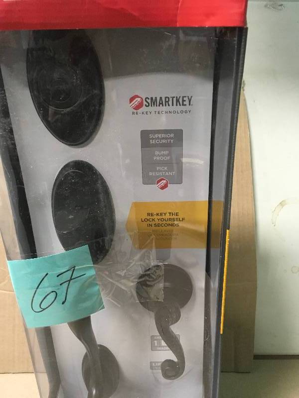 lot 67 image: Kwikset V. Bronze Door Handleset, SmartKey Security 800SEXLL 11P SMT CP  in like new condition