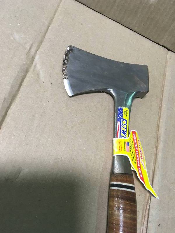 lot 83 image: Estwing 14 in. Sportsmans Axe with Leather Grip Handle  in like new condition