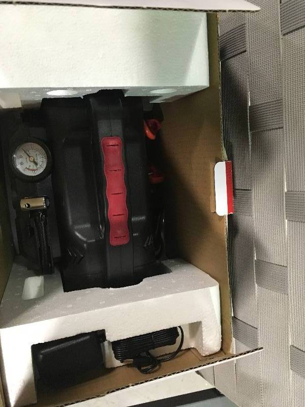 lot 13 image: Husky 8-in-1 12-Volt Power SourceJumpstarter in good working cond
