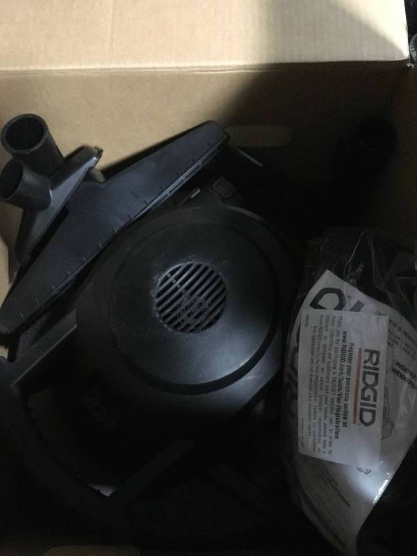 lot 23 image: RIDGID 12 Gal. 5.0-Peak HP WetDry Vac with Tumbler  in good working condition