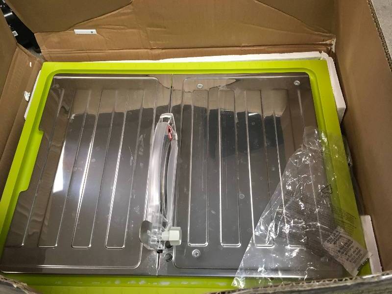 lot 86 image: Ryobi 7 in. 4.8 Amp Tabletop Tile Saw  in good working condition