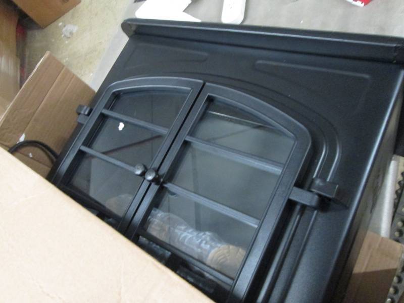 lot 21 image: Electric Stove with Remote open box...