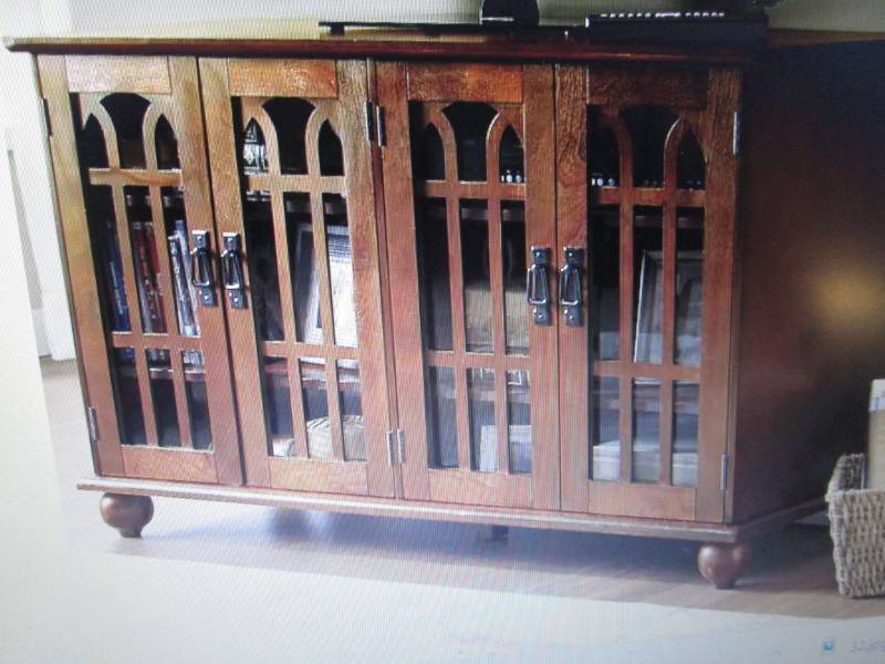 lot 48 image: Arched-Door Mission Style 4-Door TV...