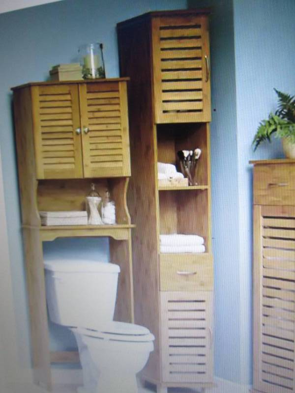 lot 202 image: Tall Bamboo Finish Towel Cabinet op...