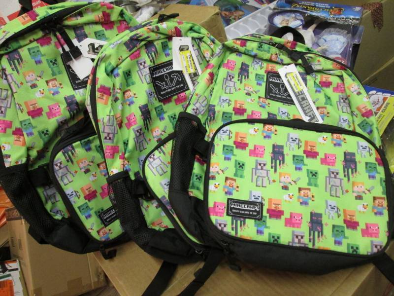 lot 55 image: Lot of 3 Minecraft Back Packs Retal...