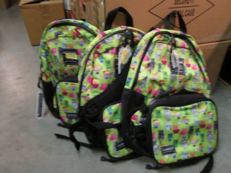 lot 56 image: Lot of 3 Minecraft Back Packs Retal...