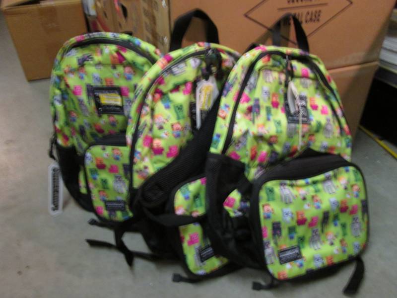 lot 57 image: Lot of 3 Minecraft Back Packs Retal...