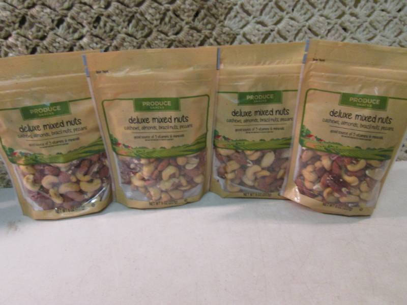 lot 189 image: 4 Bags of Deluxe Mixed Nuts Best by...