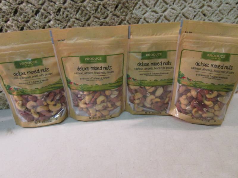 lot 190 image: 4 Bags of Deluxe Mixed Nuts Best by...