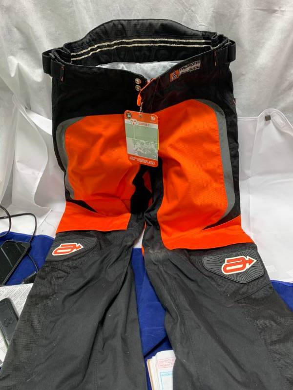 lot 34 image: Arctiva Snowmobile Pants Size 34 Waist