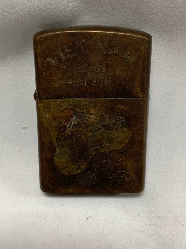 lot 50 image: Vietnam Hand Carved Zippo Lighter from Saigon
