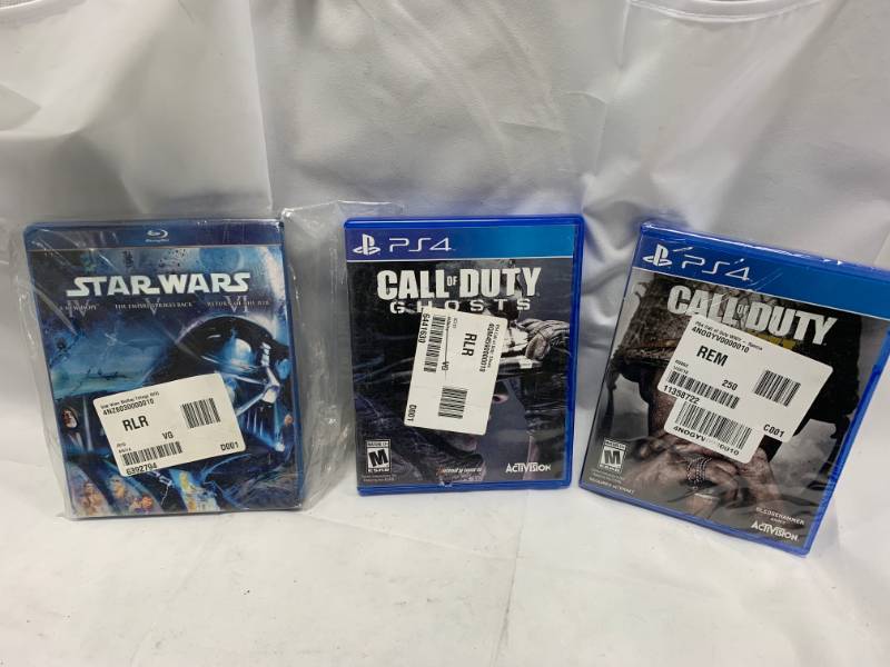 lot 74 image: Lot of 2 PS4 Call of Duty Games plus Star Wars Trilogy Blue-ray