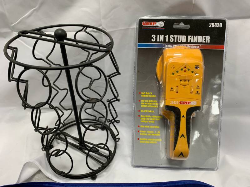 lot 111 image: Keurig Spinning K-cup Holder & 3 in 1 Stud Finder