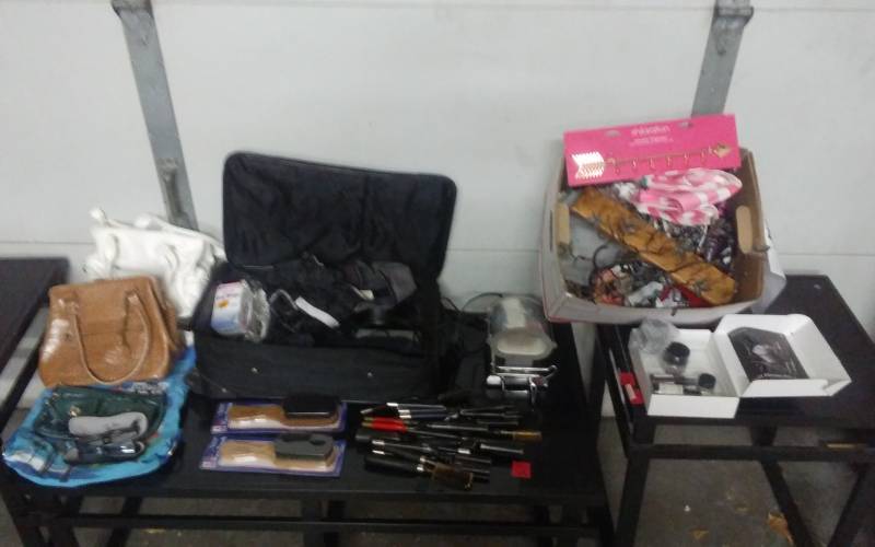 lot 28 image: Suitcase Full Of Hair Care, Irons, Misc. Jewelry, Organizer, Victorias Secret Tote, Vera Bradley Coin Purses