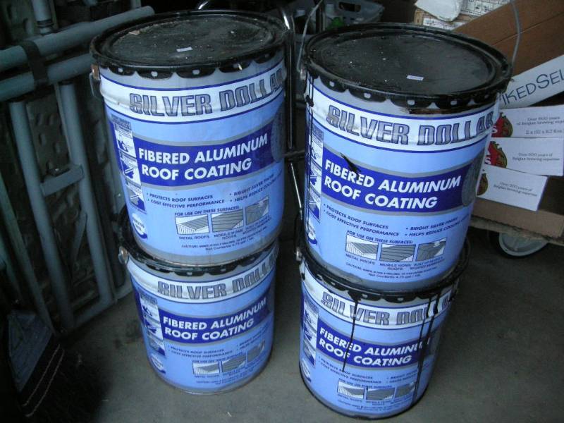 lot 35 image: 4 Cans Silver Dollar Roof Coating