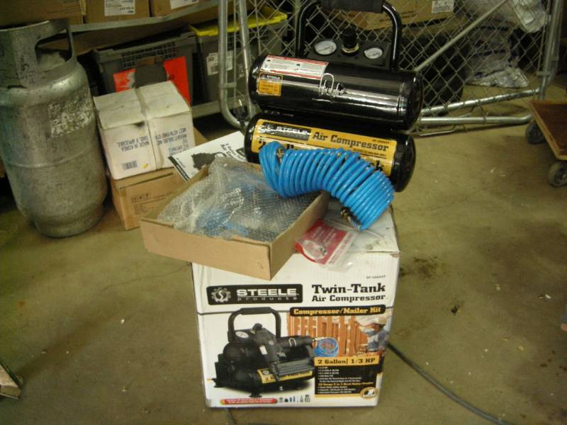 lot 2 image: Portable Air CompressorNailer Kit