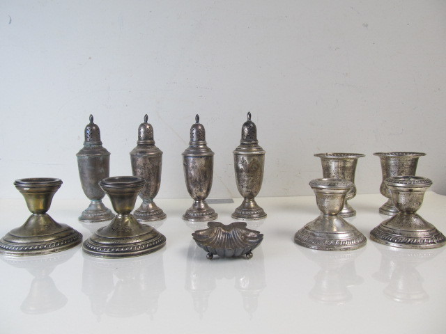 lot 68 image: Large Group of Sterling Silver Candle Holders & SaltPepper Shakers