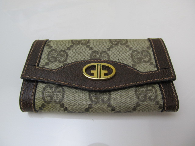lot 80 image: New Old Stock Authentic Vintage Italian GUCCI Leather Key Wallet