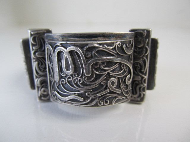 lot 82 image: Large Vintage Hand Made Sterling Silver Bedouin Style Bracelet