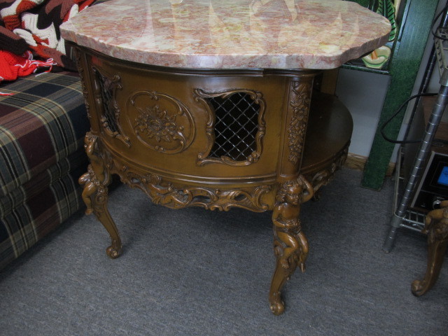lot 17 image: Antique Marble Top Hand Carved Cherub Parlor Table