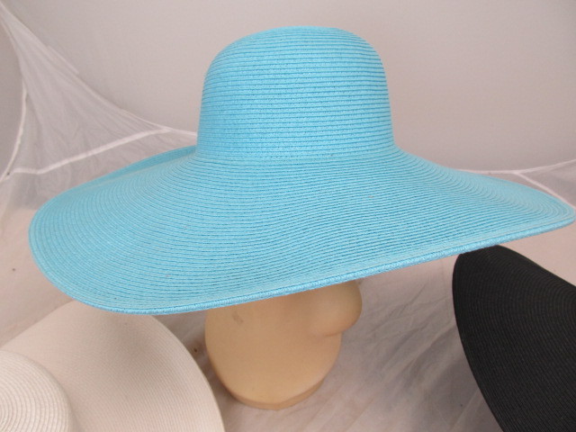 lot 76 image: Set of 4 Extra Long Brim Sun Hats - Solid Red, Blue, White & Black