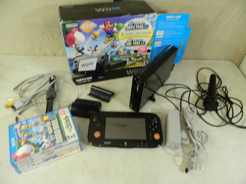 lot 124 image: Nintendo Wii U System with Games