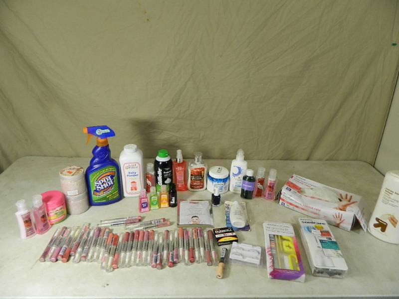 lot 143 image: 36 New Covergirl Lip Shine and More