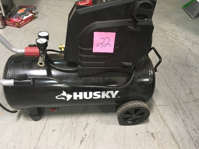 lot 22 image: Husky 8 Gal. Portable Oil Free Electric Air Compressor in like new condition