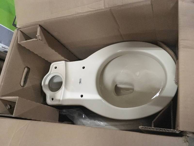 lot 65 image: American Standard Cadet 3 FloWise 2-Piece 1.28 GPF Single Flush Round Front Toilet in Bone not used