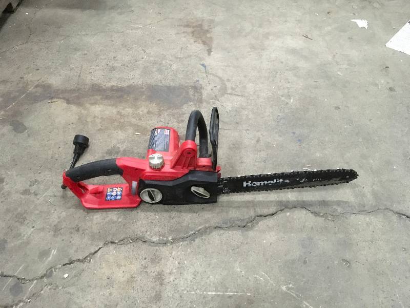 lot 82 image: Homelite 14 in. 9 Amp Electric Chainsaw in very good condition