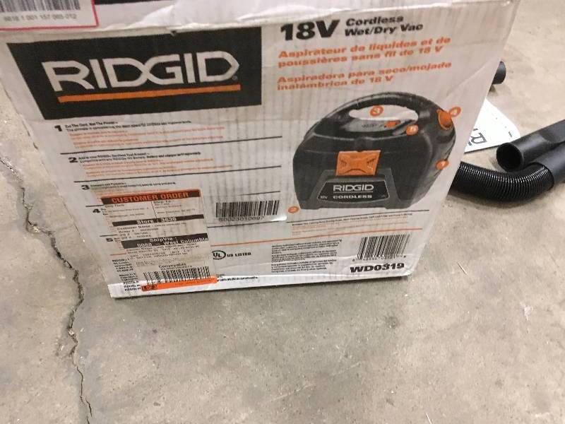lot 86 image: RIDGID 3 Gal. 18-Volt Cordless Handheld Wet Dry Vac in good condition