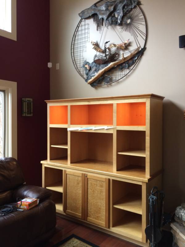 lot 11 image: WOW MSRP $8000 KRANTZ DESIGN CUSTOM MADE EXOTIC BIRDSEYE MAPLE WOOD LIGHTED ENTERTAINMENT SYSTEM - JUST GORGEOUS THIS PIECE DOES HAVE A FEW WATER SPOTS THAT IS EASILY FIXED WITH POLISH