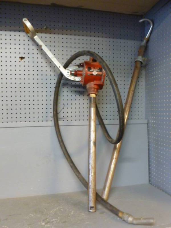 lot 65 image: Barrel Oil Pumps