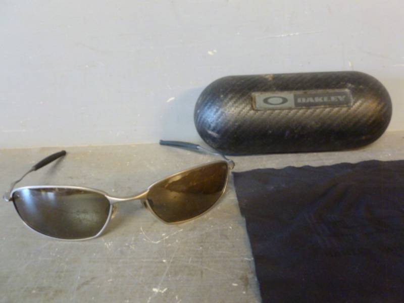 lot 209 image: Oakley Sunglasses