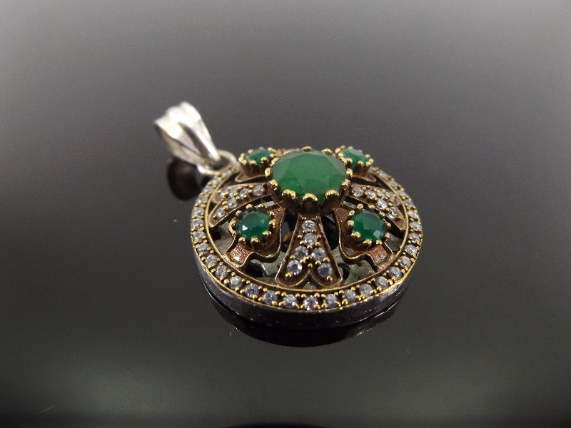 lot 54 image: .925 Sterling Silver and Bronze Turkish Emerald and White Topaz Pendant