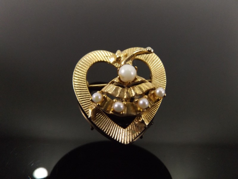 lot 73 image: Vintage Gold with Pearl Accents Dancing Lady Heart Brooch