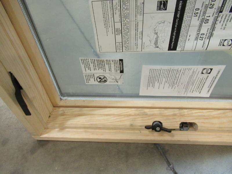 lot 81 image: Pella 23 W X 35 Tall LH Casement Window, Brown Exterior, Unfinished Interior.