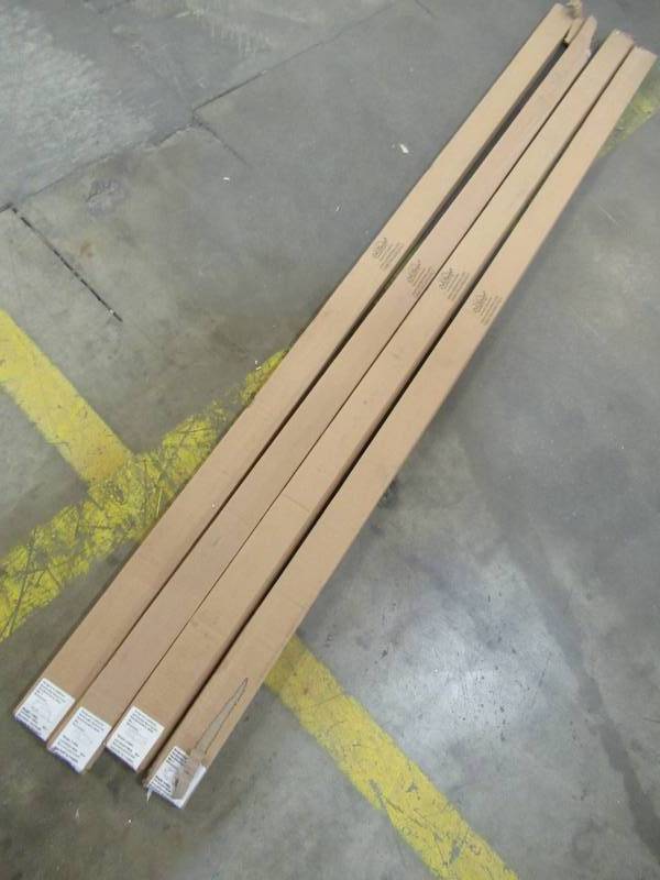 lot 26 image: Four 6 X 2 Pieces of Cali Bamboo Fossilized Eucalyptus Mocha T-Moulding. 7104009219