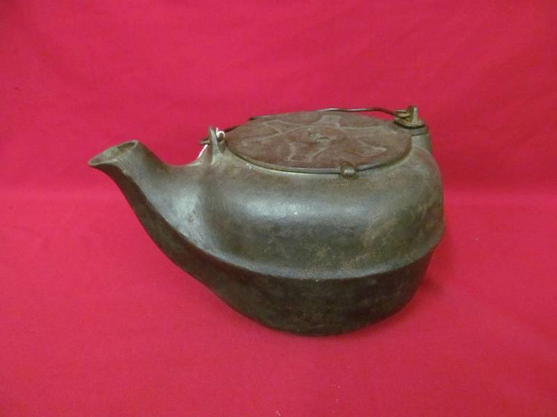 lot 69 image: vintage A & J cast-iron tea kettle