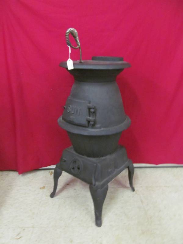 lot 77 image: Sun 50 Cast iron potbelly stove