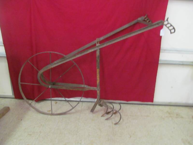 lot 83 image: primitive hand plow