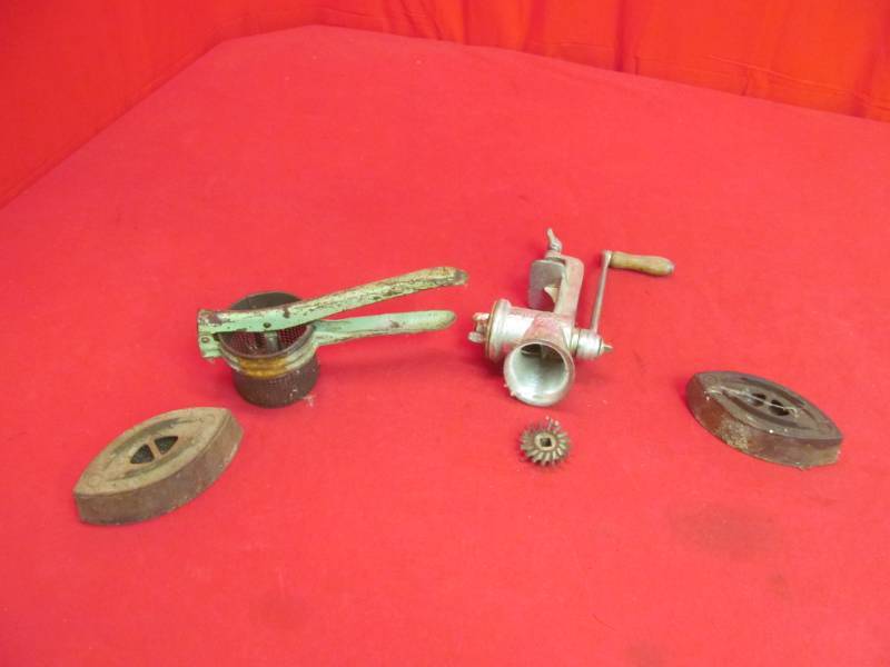 lot 33 image: vintage Keystone food chopper, sad irons, ricer