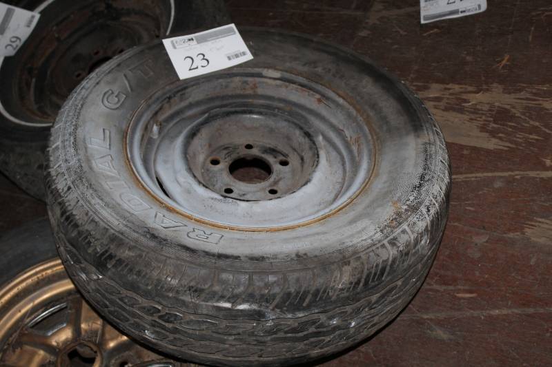 lot 23 image: Radial GT P21570R14 Tire with 5in. 5-Lug 14in. Wheel